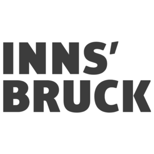 Das grafische Logo der Stadt Innsbruck mit dem zweizeiligen Schriftzug INNS' BRUCK.
