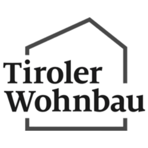 Logo der Tiroler Wohnbau mit schwarzem Schriftzug und stilisiertem Hausrahmen